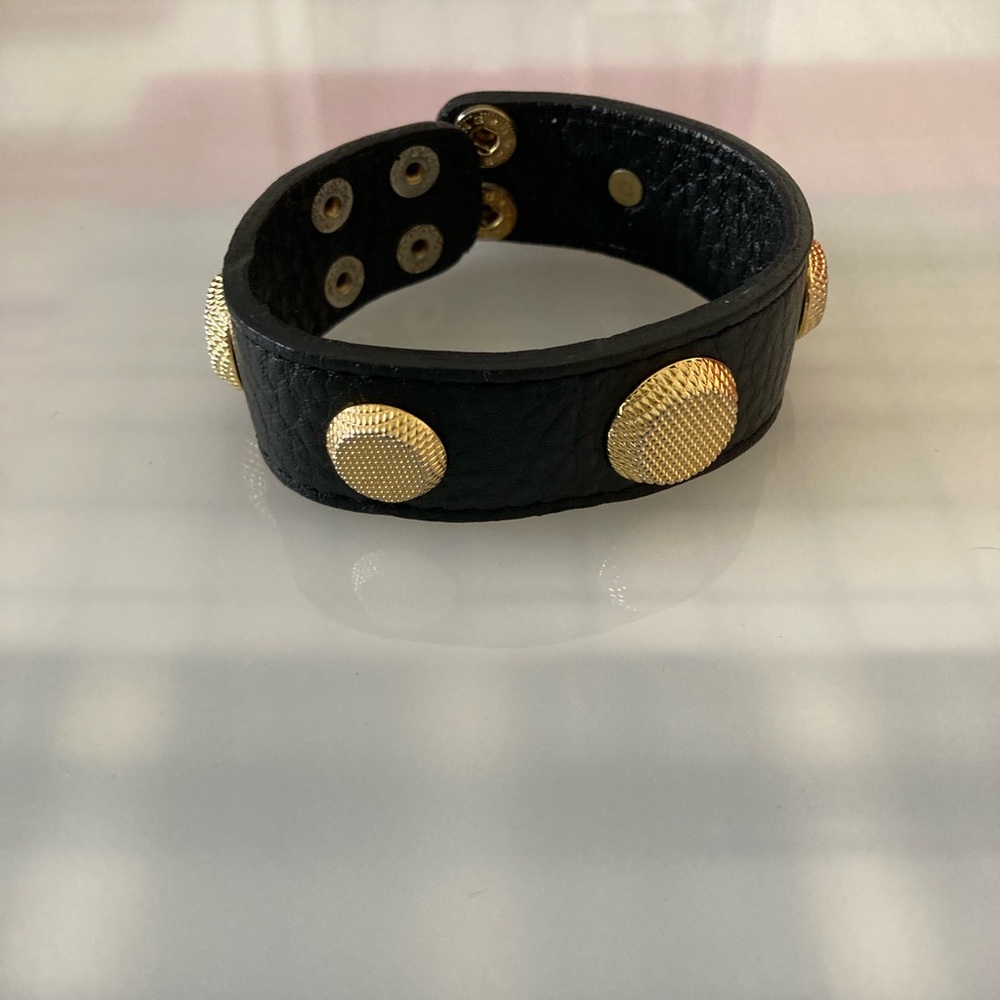 King Star wrap bracelet black, leather, gold tone accents.